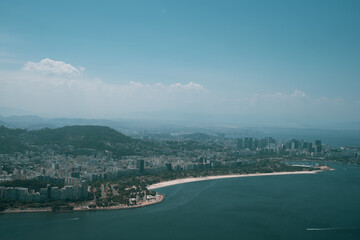 View of the Sugar Loaf in Botafogo, a mountain, and a landscape of Rio de Janeiro from a cable car, Brazil. 