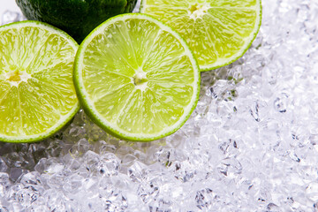 fresh lime slices on the ice