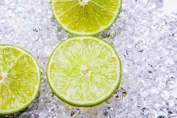 fresh lime slices on the ice