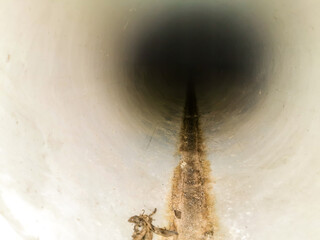 closeup and inside view of a drainage pipe 