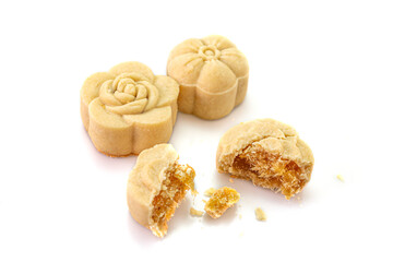 Delicious pineapple bread of flower shaped and inside with preserved pineapple put on a white background. Close-up, Selective focus.