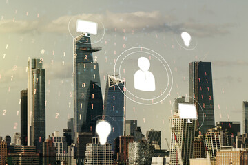 Double exposure of abstract virtual social network icons on New York city skyscrapers background....