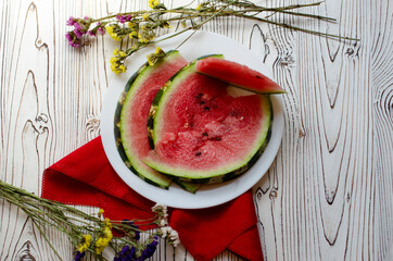 watermelon slices on a white plate