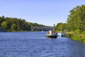 Fototapeta na wymiar The Oder-Havel Canal with the bridge from the memorial brickworks in the background, Sachsenhausen - Germany 