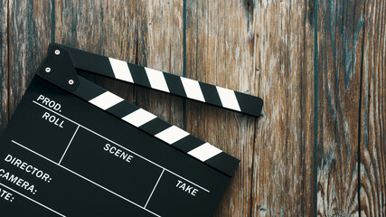 Clapper board on wood