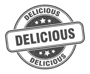 delicious stamp. delicious round grunge sign. label