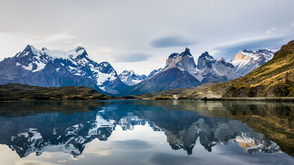 Fototapeta na wymiar Torres del Paine over the Pehoe lake, reflection, sunset, Patagonia, Chile