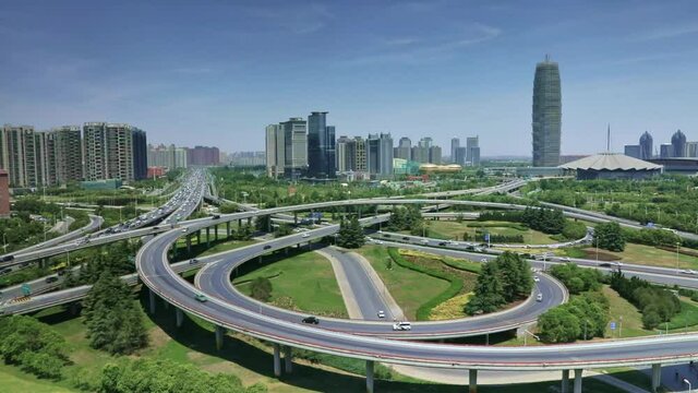 Cityscape in Zhengzhou of Henan on sunny day, overpass and buildings