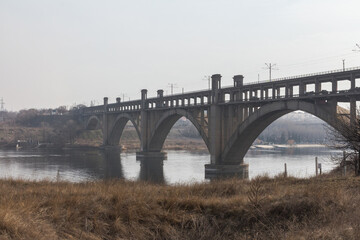 Fototapeta na wymiar View of the Preobragensky Bridge in Zaporizhzhia in the morning. Ukraine