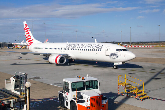 Melbourne, Australia: March 26, 2018: Virgin Australia airplane on the runway at Tullamarine Airport. Virgin Australia is Australia's second-largest airline after Qantas. Illustrative Editorial 