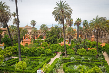 Fototapeta na wymiar Panoramic view of the gardens of the Alcazar palace in Seville, Spain.
