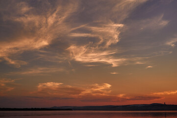 sky at sunset in warm tones and mottled blocks