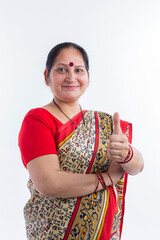 Traditional Mature woman showing thumbs up