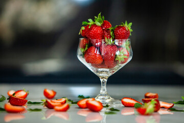 glass bowl with fresh strawberries isolated. Strawberry juice.  