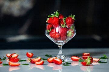 glass bowl with fresh strawberries isolated. Strawberry juice.  