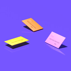 Pink, orange, and yellow credit cards lie on a dark blue background. 3D render.