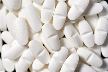 Close-up of large white pills