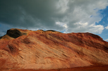 A canyon with a mountain in the background