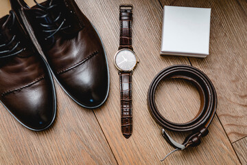 Wedding attributes of the groom. shoes, watch, belt, box for decoration
