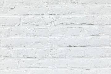 old white brick wall painted in white as harmonic background