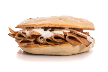 Kebab sandwich with sauce isolated on white.