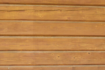 Fototapeta na wymiar The wall is wooden. The tree is painted brown.