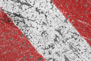 Old red and white painted asphalt texture