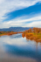Fototapeta na wymiar Winter view of River Serchio near the city of Lucca in Tuscany