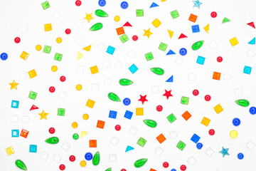 multicolor plastic shape on white background