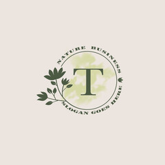 Circle nature tree T letter logo with green leaves in circle line shape for Initial business style with botanical leaf elements vector design.