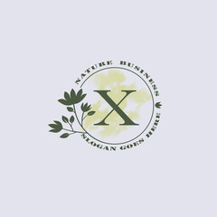 Circle nature tree X letter logo with green leaves in circle line shape for Initial business style with botanical leaf elements vector design.