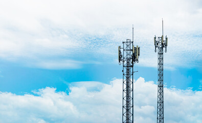 Telecommunication tower with blue sky and white clouds. Antenna on blue sky. Radio and satellite...