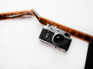 Vintage mock up /explore mockup with old vintage camera, space for text. Adventure template with retro elements, film roll, holiday hipster traveler mock-up. Working desk branding mock up top view.
