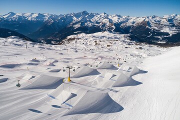 Aerial drone view of Madonna di Campiglio and ursus snowpark in Val Rendena dolomites Italy