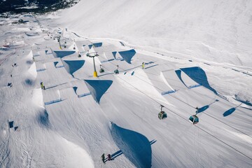 Aerial drone view of Madonna di Campiglio and ursus snowpark in Val Rendena dolomites Italy