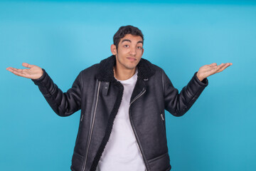 teenager latin young man isolated on color background