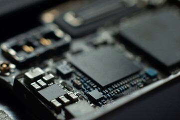 Smartphone motherboard close-up, macro shot.