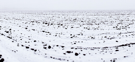 Black earth under the snow