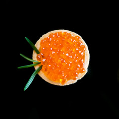 caviar on a black background