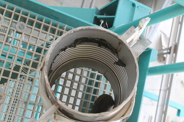 Fototapeta premium Oil pipes at a petrochemical plant in the production of oil and gas