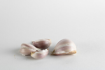 isolated garlic cloves on a white background