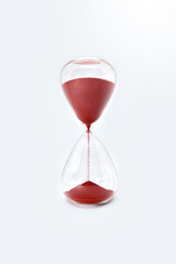 Fototapeta na wymiar Hourglass sandglass clock isolated on white background. close up view. close up