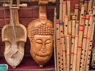 Nepali sarangi and Bansuri flutes on a street shop in Kathmandu, Nepal.