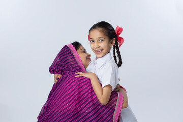 Portrait of happy mother and daughter