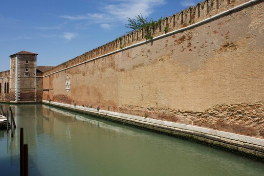 Rio de le Vergini in Venice, with the historic Arsenal walls