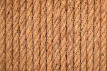 Brown twisted rope in aline. Brown and yellow rope textured background. Rope pattern for background.