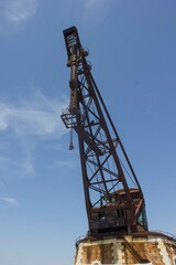 Fototapeta na wymiar detail of a nautical lifting crane in Venice arsenal