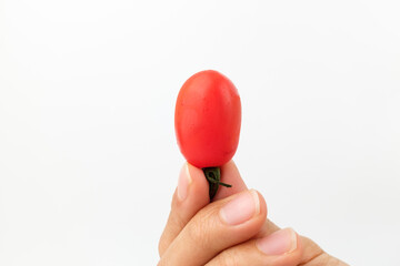 Cherry tomatoes on a white background