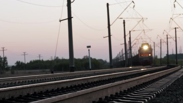 Arrival, transit flight of freight train with row of shipping container, heavy goods delivery. Business as transportation or supply of cargo, commercial trucking industry, intermodal railway logistics