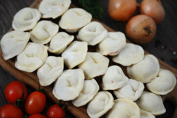 Dumplings manual molding. Rustic food. Selective focus.